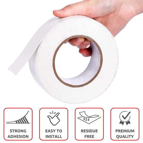Hand holding Two Sided Rug Tape That Grips Like Crazy For Area Rugs And Floor Mats Easy Peel Adhesive For Wood Tile And Textured Surfaces Non Slip Carpet Tape White 2 In By 10 Yd roll