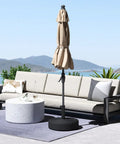 Heavy Duty Water Fillable Round Umbrella Base Weight Workhorse 88 Lb Stand for Patio Outdoor Market Table Umbrella in use