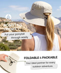 Woman wearing Women's Ponytail Hole Sun Hat With Wide 3.5 Inch Brim For Hiking And Summer Outdoor UV Protection Beige Bucket Safari Hat UPF 80 Plus All Day Sun Shield, showing ponytail hole.