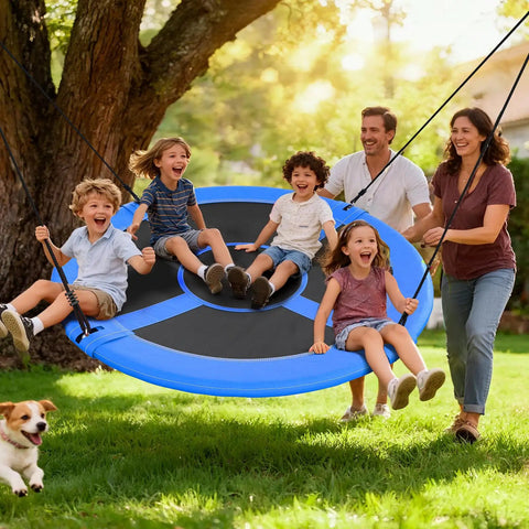 Family enjoying 60 Inch Large Saucer Tree Swing For Kids And Adults With 700 Pound Capacity in backyard with kids swinging