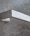 Close-up of wall-mounted Stainless Steel 24 Inch Towel Bar Rack with Brushed Nickel Finish, modern bath towel rail visible.