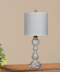 Pair Of 26 Inch Distressed Balustrade Resin Table Lamps In Cottage Antique White Finish With Designer White Shades 2 Piece Set For Living Room Or Bedroom Decor Great For Farmhouse Style Cozy Vintage Vibe, single lamp close-up.