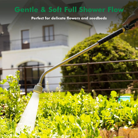 Extra Long 36 Inch Watering Wand With Thumb Flow Control spraying plants in a garden