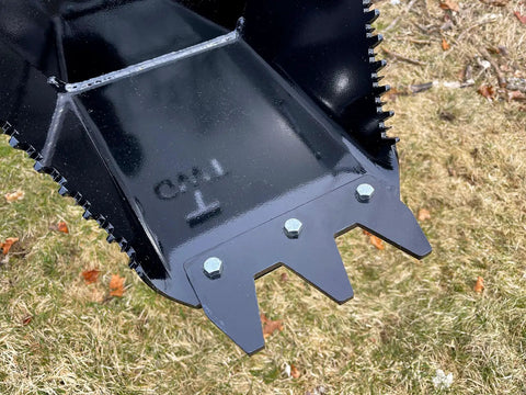 Close-up of Beefy Mini Wrecker Stump Bucket For Small Tractors Heavy Duty Tractor Attachment showing serrated digging edge.
