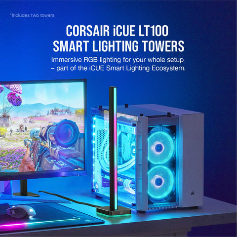 ICUE LT100 Smart Lighting Tower Starter Kit on a desk with gaming PC and monitor, showcasing ambient RGB effects.