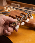 Mandolin Tuner Pegs And Acoustic Guitar Tuning Peg Knobs Set Of 4 Left 4 Right Replacement Hardware Classic Style Durable Guitar Tuning Keys For Stable Tuning And Smooth String Post Adjustments, white knobs held by hand