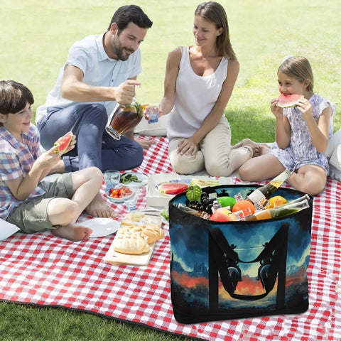 Family picnic with Desert Cowboy Style Insulated Cooler Tote containing drinks and snacks, on a red checkered blanket.