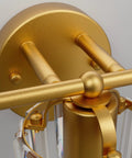 Close-up of 3 Light Gold Vanity Light Fixture For Bathroom With Crystal Accents Over Mirror, showing gold finish and crystal detail.