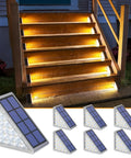 Six Pack Solar Step Lights Warm White Outdoor IP67 Waterproof Stair Lights Auto On Off illuminating wooden stairs at night