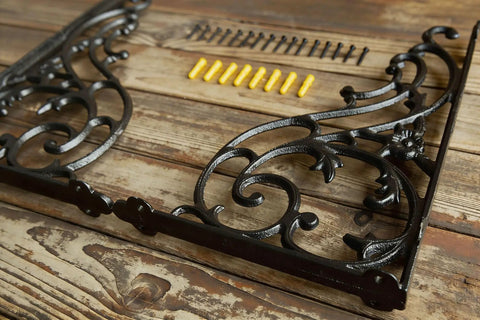 16 Inch Cast Iron Shelf Brackets 4 Pack Black Corbels with mounting hardware, detailed design, heavy duty for wall support.
