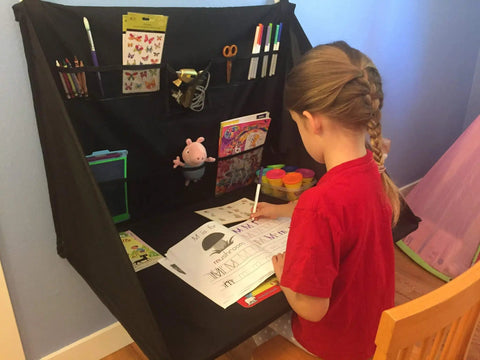 Child using Mini Portable Standing Desk Workstation For Home Office Garage Shop, Lightweight Foldable Work Surface With Built In Storage, Black