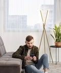 LED Tripod Floor Lamp For Living Room And Bedroom, Dimmable Modern Standing Lamp With 3 Lights shown next to a grey sofa