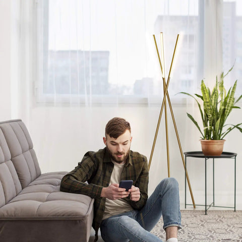 LED Tripod Floor Lamp For Living Room And Bedroom, Dimmable Modern Standing Lamp With 3 Lights shown next to a grey sofa