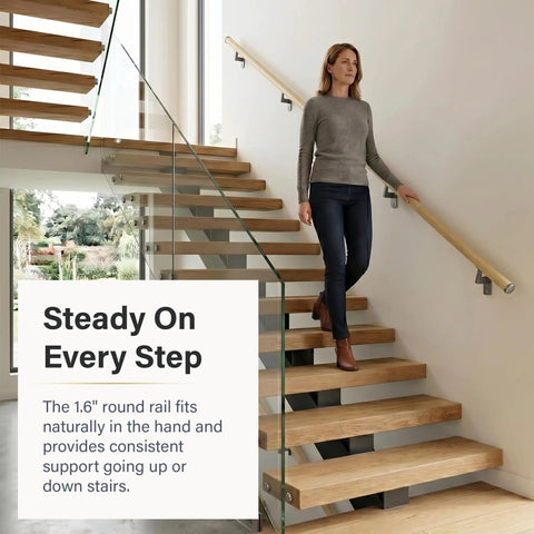 Woman using Oak 3-Foot Flush Handrail Kit For Indoor Stairs, 1.6-Inch Round Wood-Wrapped Aluminum Core Rail, modern design
