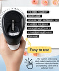 Retro Manual Embossing Label Maker With 9mm Tapes in hand, showing black embossed labels for scrapbooking and DIY crafts.