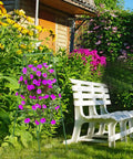 Heavy Duty 47 By 16 Inch A Frame Garden Trellis for climbing flowers with netting, placed in a lush garden near a white bench.
