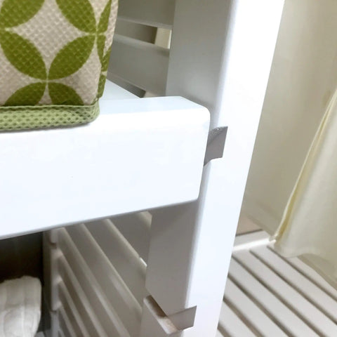 Heavy Duty Solid Wood Closet Storage Rack With Wide Shelves And Hanging Rods Straight Up Kickin Up Your Reach In Space Cut To Fit Any Pantry Or Laundry Closet White close-up of sturdy white shelf and decorative storage bin.