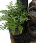 Close-up of Outdoor Cascading Water Fountain With Pump Included For A Chill Backyard Oasis, Durable Polyresin And Fiberglass Garden Feature, with greenery