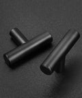 Top Shelf Matte Black Cabinet Knobs And Drawer Pulls 30 Pack Stainless Steel Single Hole T Bar Hardware For Kitchen Bathroom Cupboards 2 Inch Smooth Finish Easy Install Your Home Refresh Game Changer, close-up view of matte black T bar handles.