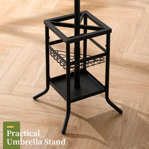 Freestanding Coat Rack With Umbrella Holder Twelve Hooks Three Tier Metal Coat Tree base close-up, black metal stand on wood floor.
