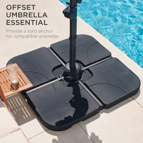Heavy-Duty Cantilever Offset Patio Umbrella Stand With Four Interlocking Base Plates, 155lb Capacity by a poolside
