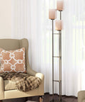 Tall Floor Lamp With Amber Glass Shades And Bronze Finish, Classic Traditional Style, 63.5-Inch Height in living room by chair