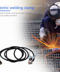 Heavy Duty 300 Amp Grounding Welding Earth Clamp Clip With 10-25 Plug Connector For MIG TIG Machines on work surface, sparks flying.