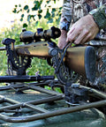 FlexGrip Pro Mounting Rack For Gun, Bow, Ice Augers And Tools, Universal ATV Fit in use securing a rifle on an ATV rack