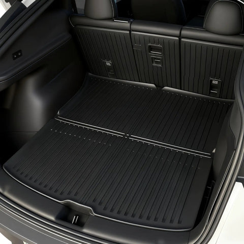 Rear trunk view of Tesla Model Y Juniper All Weather Floor Mats And Cargo Liners 9 Piece CabinProtect Pro Kit for rugged use.