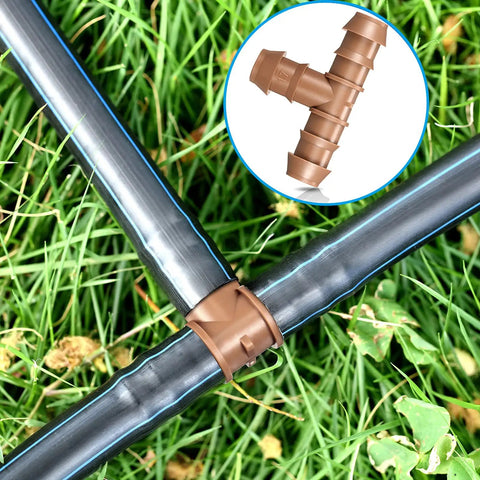 Drip Irrigation Fittings Kit Half Inch Tubing Set With 36 Pieces Including 9 Tees 9 Couplings 9 Elbows 9 End Cap Plugs Barbed Connectors For Sprinkler Systems And Garden Easy Install showing barbed tee connector on grass