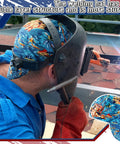 Man welding in blue shirt wearing 4 Pack Flame Resistant Welding Caps For Men And Women, Cotton Mesh Sweat Absorbing Welding Hats That Fit Most Helmets, Welders Caps Set For Electricians And Gas Station Pros, Classic Style