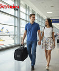 Man carrying Pro Grade Pilot Flight Deck Bag Lightweight And Water Resistant For Airbus And Boeing in airport terminal