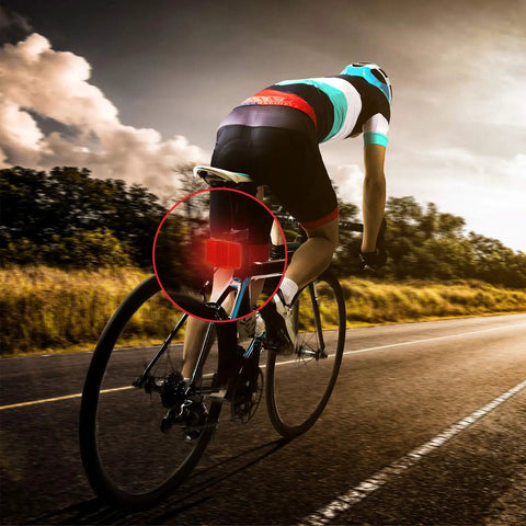 Cyclist using 4 Pack Bike Spoke Reflectors For Front And Rear, Red And White Safety Reflectors For Handlebar And Seatpost, high visibility gear