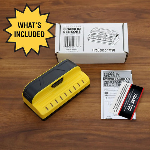 Nine Sensor Stud Finder And Wall Scanner, Pro Sensor M90, showing packaging, manual, and thank you note on wooden surface