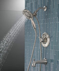 Linden 17 Series Dual Function Tub And Shower Trim Kit With In2ition 4 Spray 2 In 1 Handheld Shower Head And Hose Stainless Finish T17494 SS I Valve Not Included installed in a bathroom setting.