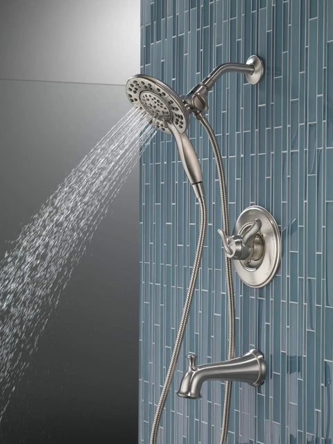 Linden 17 Series Dual Function Tub And Shower Trim Kit With In2ition 4 Spray 2 In 1 Handheld Shower Head And Hose Stainless Finish T17494 SS I Valve Not Included installed in a bathroom setting.
