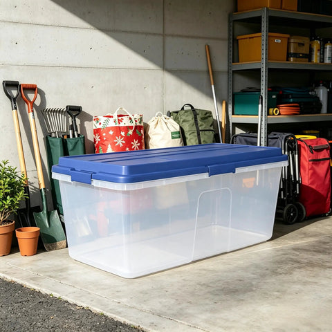 Straight Up Heavy Duty 113 Qt Long Storage Bin With Secure Snap On Lid, Crystal Clear Stackable Plastic Tote For Bulky Blankets And Seasonal Gear placed in a garage.
