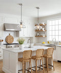 kudos 11 Inch Brushed Nickel Clear Striped Pendant Light, KDPL13-BN-C above a kitchen island with modern decor.