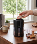 POCREATION 5 In 1 Automatic Sorter Machine Digital Counting Device With Tubes For Pennies Nickels Dimes Quarters Dollars on a wooden table.
