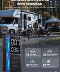 Portable Tire Inflator Air Compressor With 5200mAh Battery And 150 PSI Quick Inflate displayed outdoors with camping scene