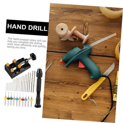 Hand Drill Jewelry Punch Tool Kit For Woodworking With Pin Vise PCB Drill Bits and crafting tools on wooden surface