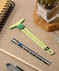 2 Pieces Sewing Gauge With Sliding Marker 5 In 1 Measuring Tool for fabric quilting, hemming ruler, and seam allowance guide on table.