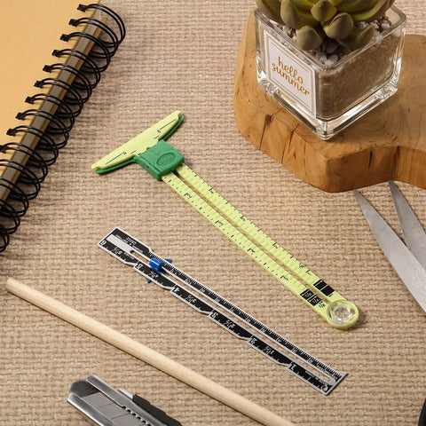 2 Pieces Sewing Gauge With Sliding Marker 5 In 1 Measuring Tool for fabric quilting, hemming ruler, and seam allowance guide on table.