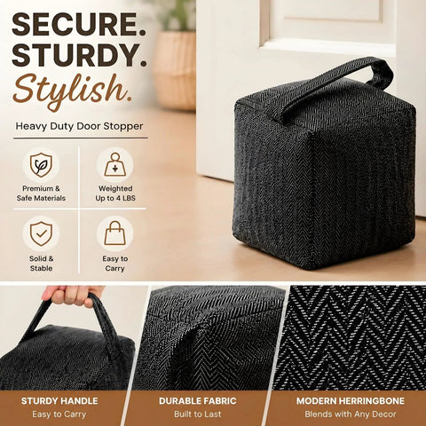 Heavy Duty Weighted Door Stopper With 4.4 Lb Internal Weight, black herringbone fabric, sturdy handle, shown in use.