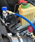 R134a Car AC Adapter Fittings with Adjustable Quick Couplers for High and Low Side installed on vehicle engine bay
