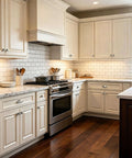 Modern kitchen with white cabinets featuring 30 Pack One And One Quarter Inch Brushed Nickel Solid Zinc Alloy Euro Style Cabinet Knobs