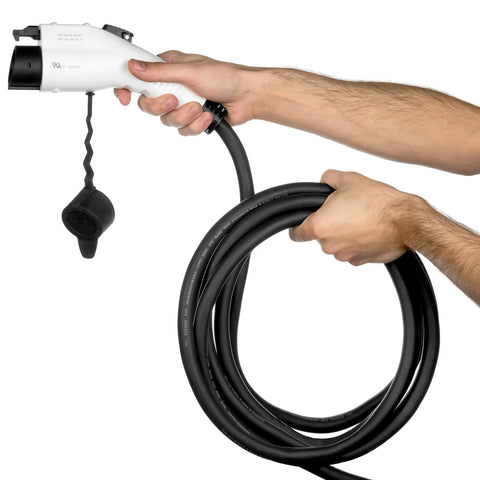 32 Amp Level 2 Electric Vehicle Charging Station With Smart Display And 25 Ft Cable held in hand, showing Nema 14 50 plug.