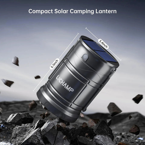 Must Have 2 Pack Solar Camping Lanterns USB Rechargeable LED Lanterns showing compact design on rocky outdoor terrain