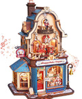 Build Your Own Bear Toy Store Miniature House Kit With 3D Wooden Puzzles And Moving Mechanics, DIY Dollhouse Studio For Grownups Featuring A Toy Train Circle And A Swaying Teddy Bear Conductor On Cozy Display Shelves.