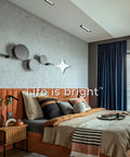 Four Head Regressed Gimbal Led Recessed Spotlight in stylish bedroom, sleek dark wall with contemporary decor.